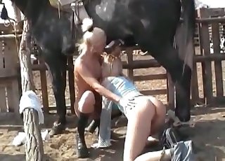 Blond-haired chick sharing horse cock