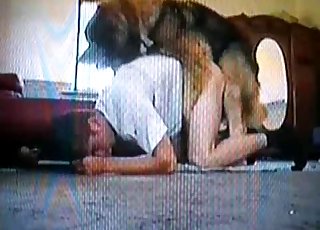 VHS video showing a dude fucking a dog