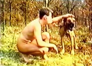 Dude seducing his own dog in the forest