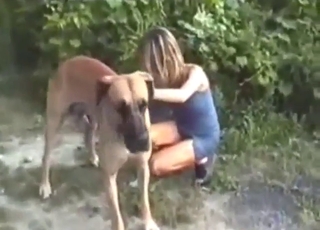 Zoophile gal fucks a dog while by the water