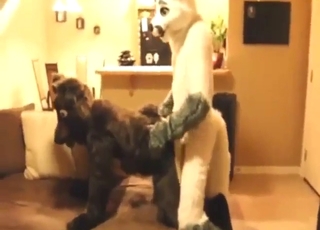 Petting his bottom's cock during furry fucking