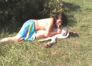 Cute-looking brunette lady wants a white dog