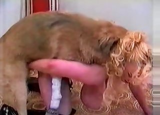 Horny doggy and a hottie with massive saggy boobs