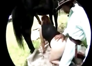 Redheaded with lots of meat on her body bangs a horse