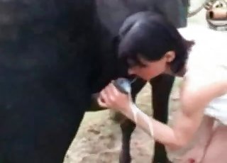 Woman with dark hair enjoying her lovely horse